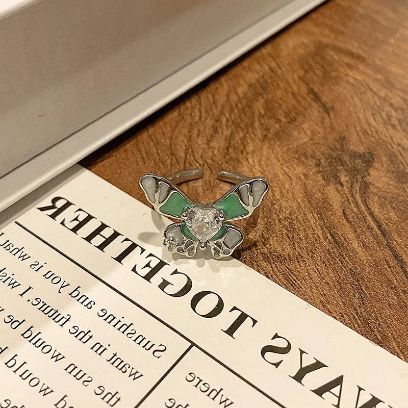 Copper women's ring with Chinese butterfly design and oil-drip finish in simple jewellery style