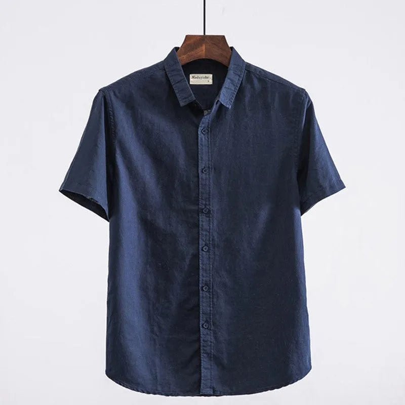 Men's loose fit short sleeve casual shirt in cotton blend fabric with a square collar.