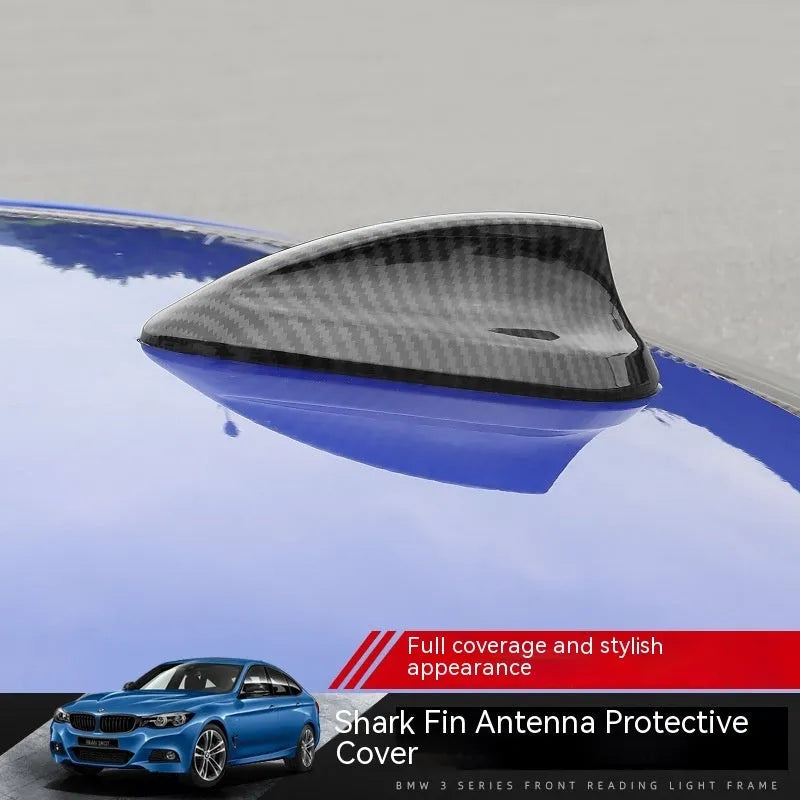 BMW shark fin antenna cover in carbon fibre pattern and piano black ABS plastic.