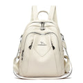 Geometric patchwork genuine leather backpack with belt decoration in beige available for travel