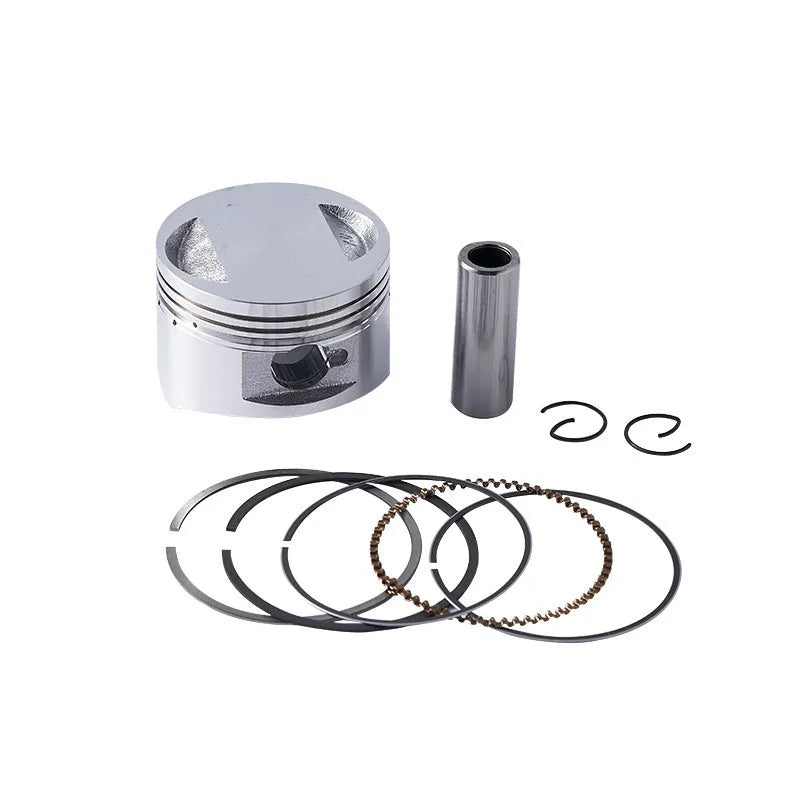 Motorcycle engine piston kit showing aluminium piston with steel combination oil ring for 57.4mm bore