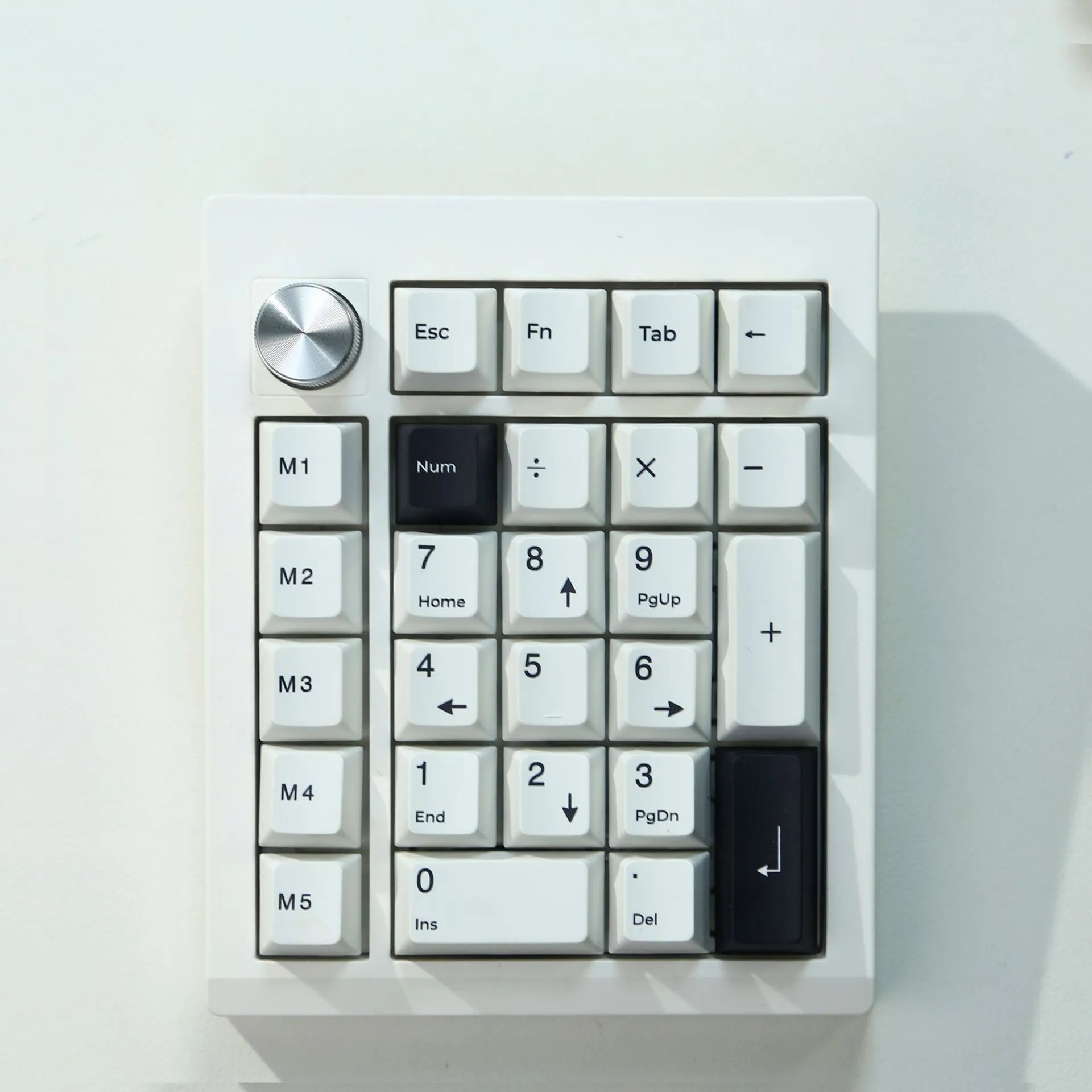 Wireless mechanical numeric keyboard with Bluetooth connectivity in black and white colour options