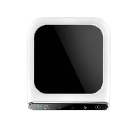 Black USB cup warmer with temperature controls and reminder light on desk