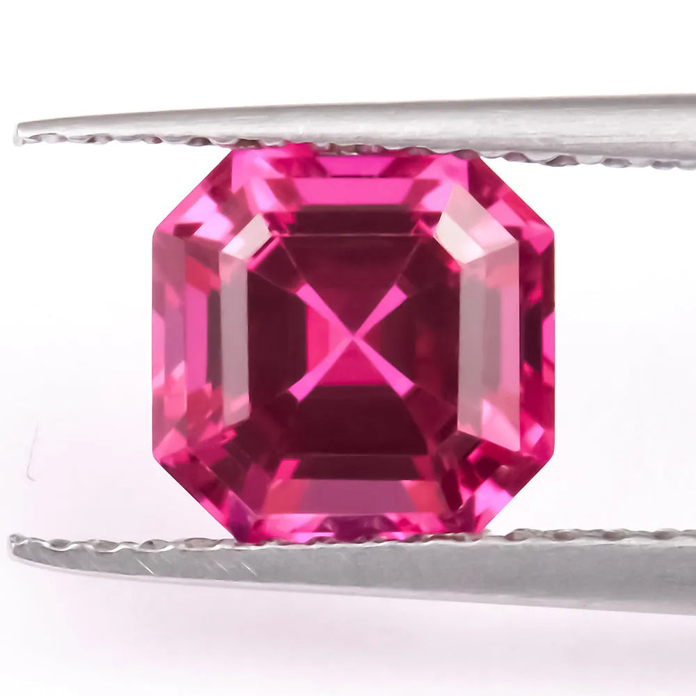 Artificial ruby gemstone in multiple cuts including round, princess square, and water drop shapes