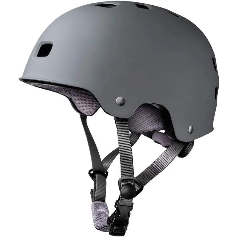 A children's skateboarding helmet shown in one of ten available colours, featuring an ABS plastic shell and EPS foam liner.