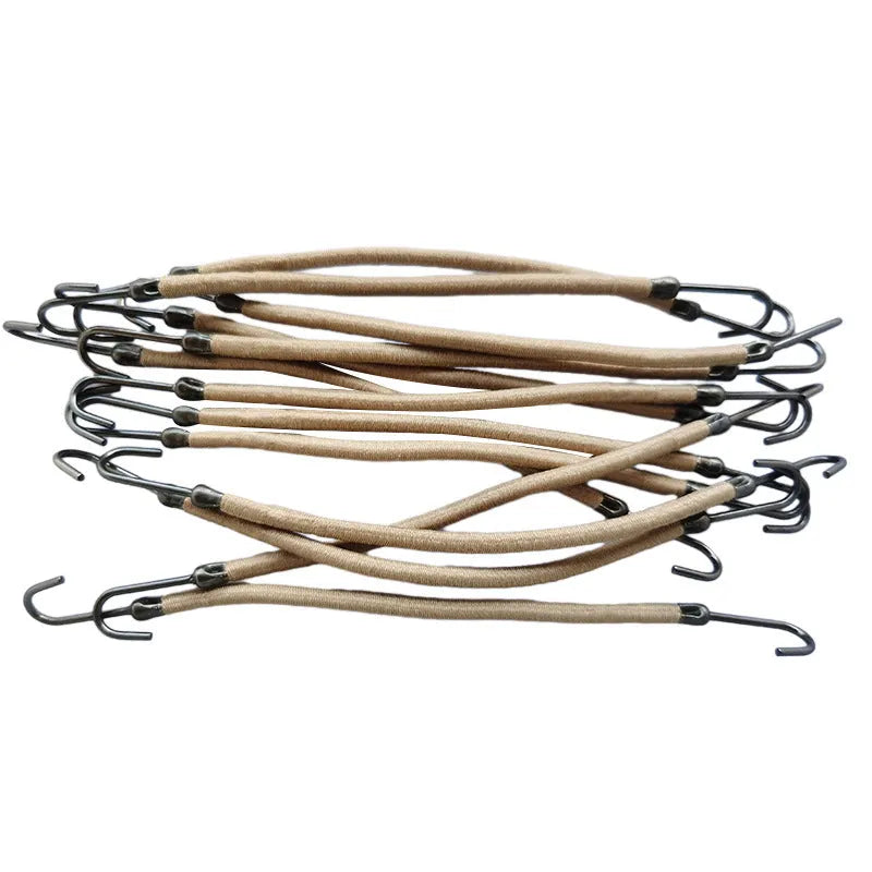 Close-up of a solid colour double hook hair tool for securing wigs and hair wefts.