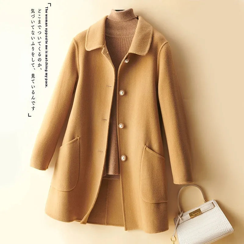 Women's double-faced wool coat with doll collar and pearl buckle in mid-length cut
