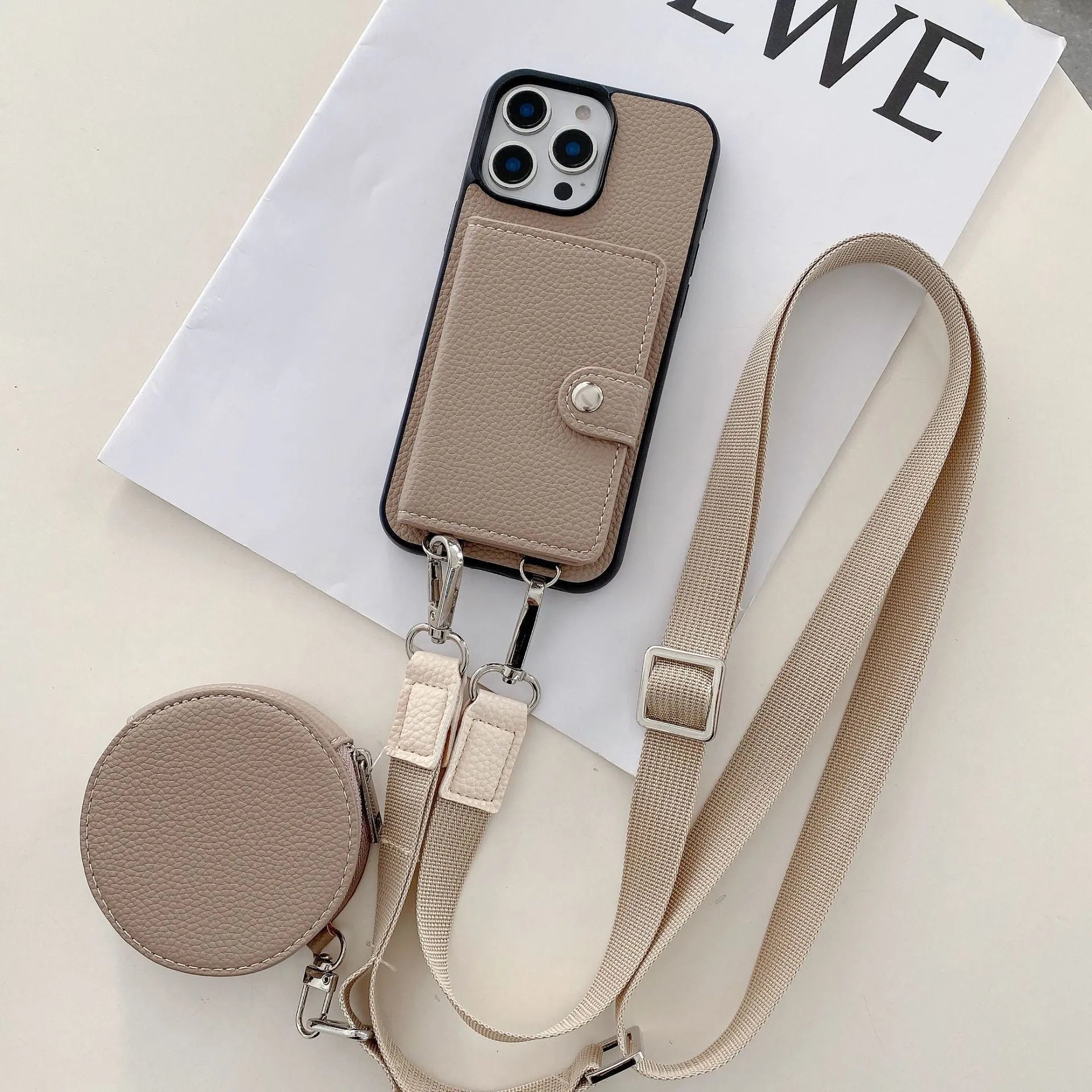 Polycarbonate leather lanyard phone case with card slot for iPhone, shown in black, brown, orange and white.