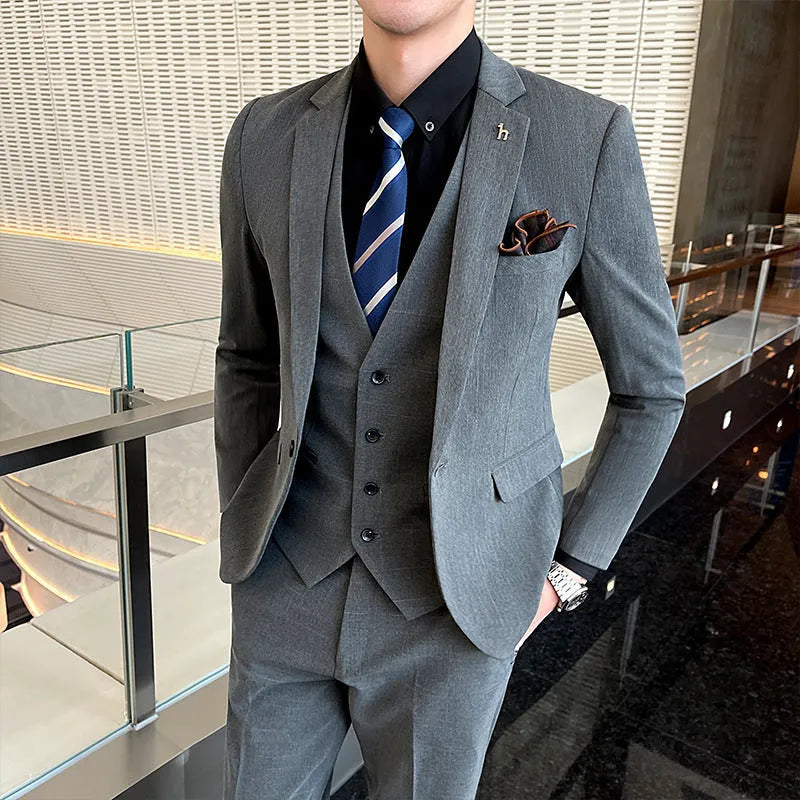 Slim fit men's business suit in British style available in black and dark grey colours