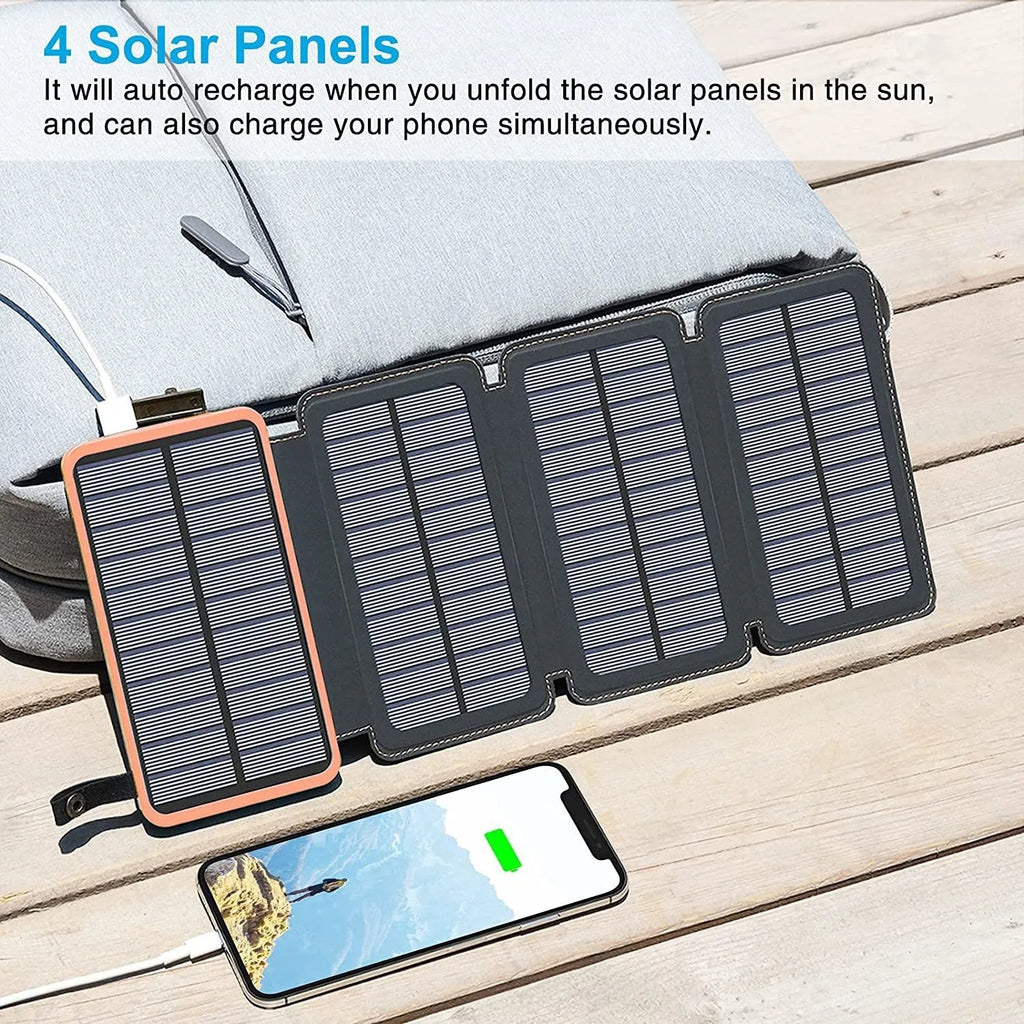 Black outdoor solar power bank with a solar panel, LED light, and soft leather texture, shown with a charging cable.