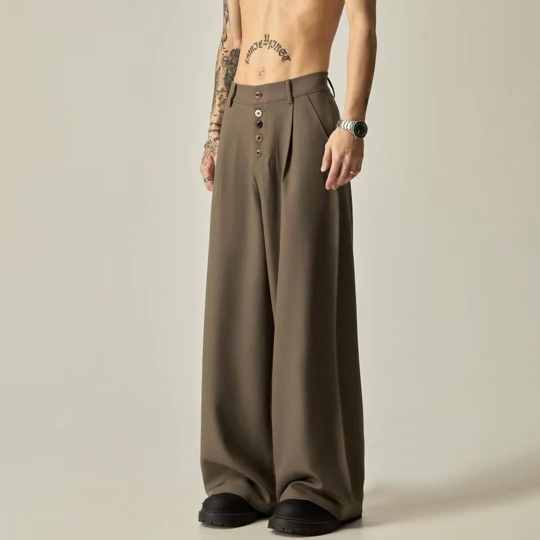 Men's solid colour cotton blend wide-leg casual trousers on a hanger, showing the straight-leg cut and button fly.