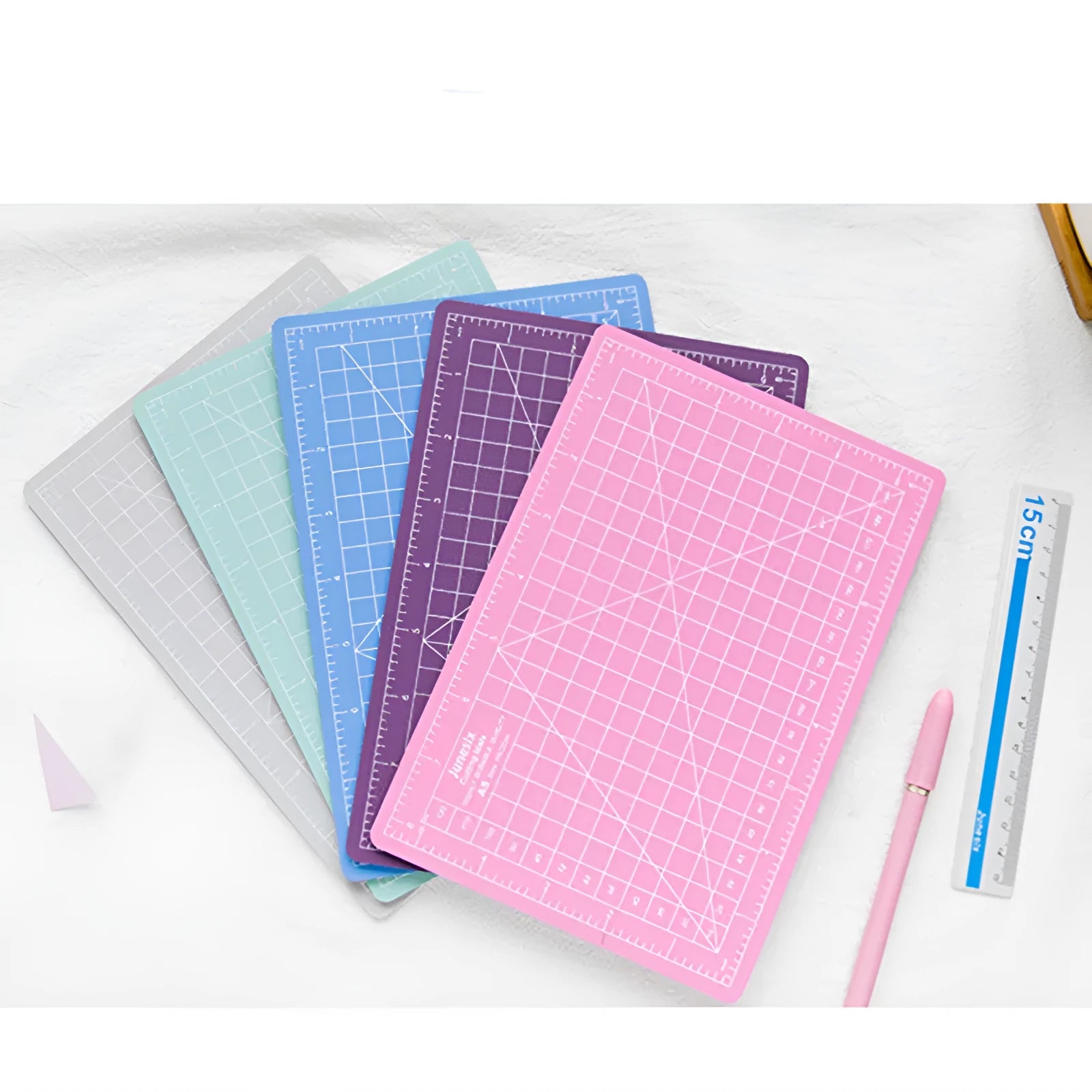 Art pen knife cutting board set with backing board, ruler, sharpener, and blade in choice of colours