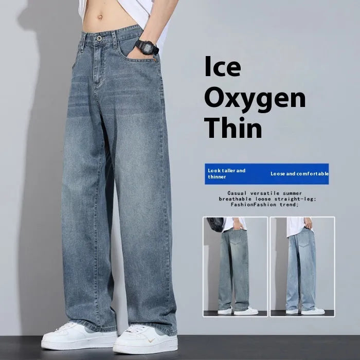 Straight leg denim trousers in a wide leg style on a hanger, showing the zip fly placket.