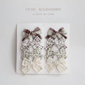 Dovetail bow hairclip set for children in cloth material with eight colour options