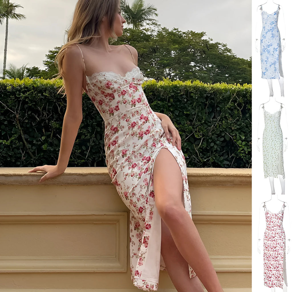 Women's long blue lace print dress with a high side slit and thin black suspender straps.