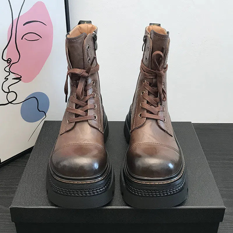 Women's black or brown ankle boots with 3-5 cm chunky mid heel, side zipper, waterproof platform, round toe, and rubber sole.