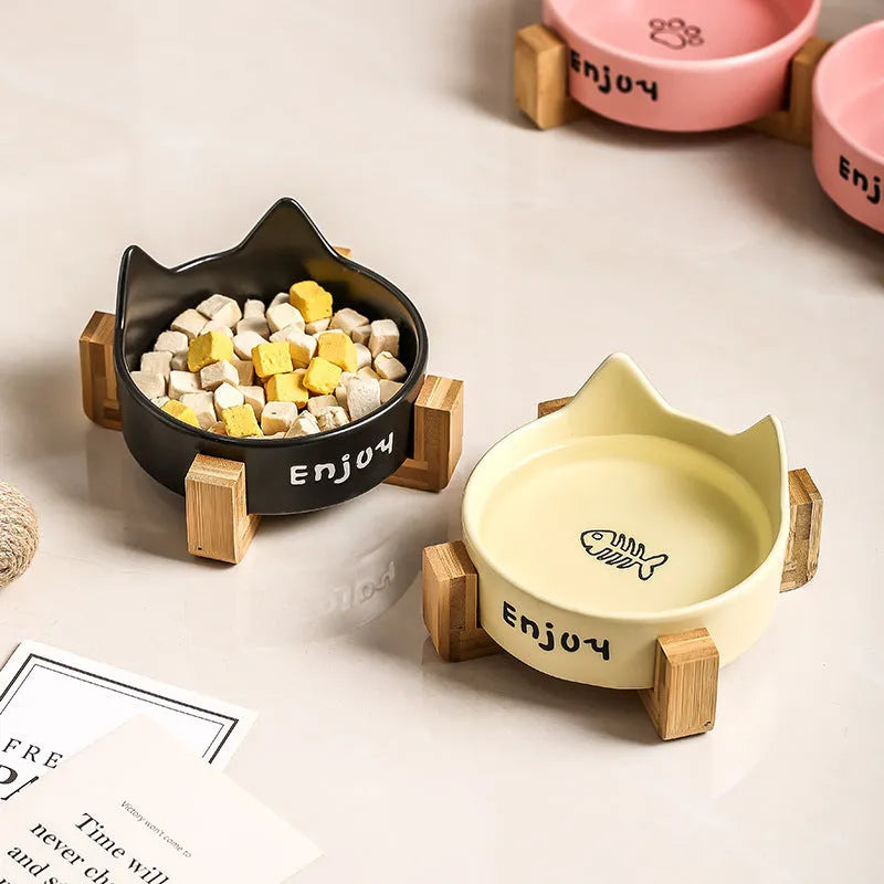 Ceramic cat bowl set with wooden anti-slip frame in cat paw design