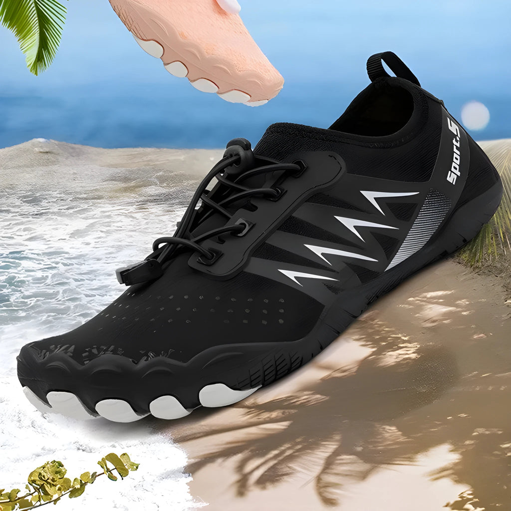 Low-top river tracing shoes in apricot colour with mesh upper and rubber sole.