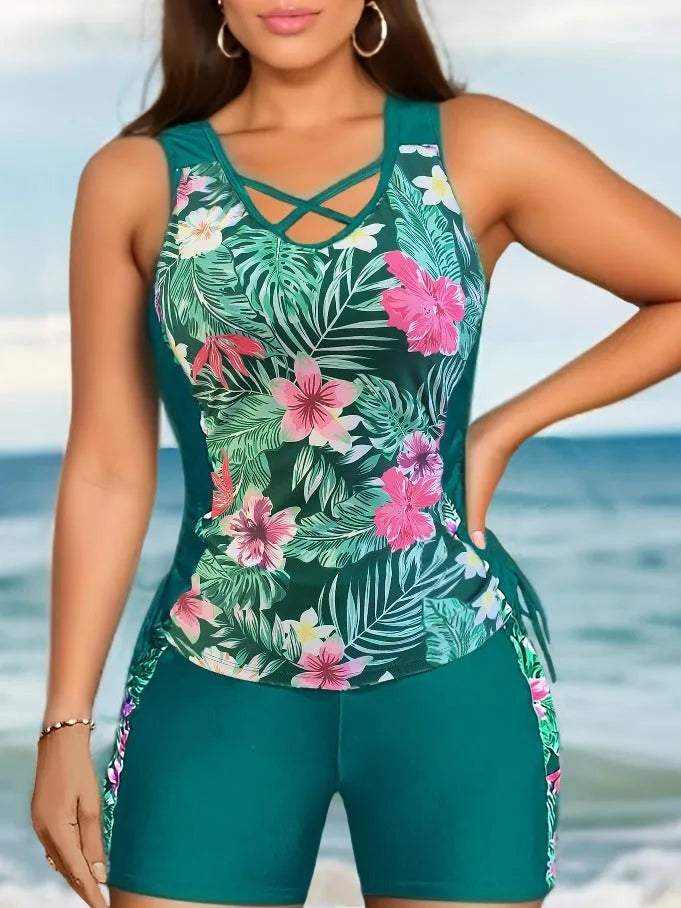 Women's plus size floral print high-waisted bikini swimsuit in navy blue.
