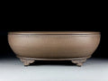 Handmade oval purple sand ceramic flowerpot measuring 50x39.5x16cm for desktop or ground plant display