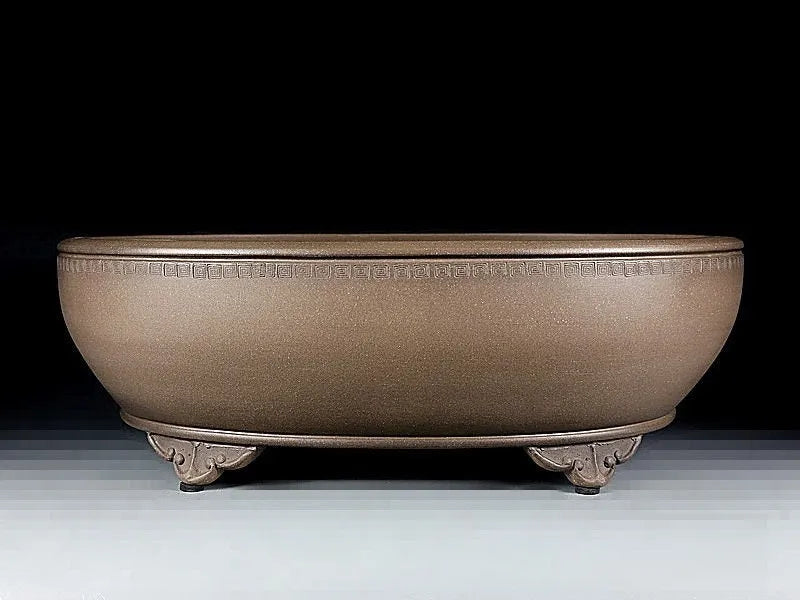 Handmade oval purple sand ceramic flowerpot measuring 50x39.5x16cm for desktop or ground plant display