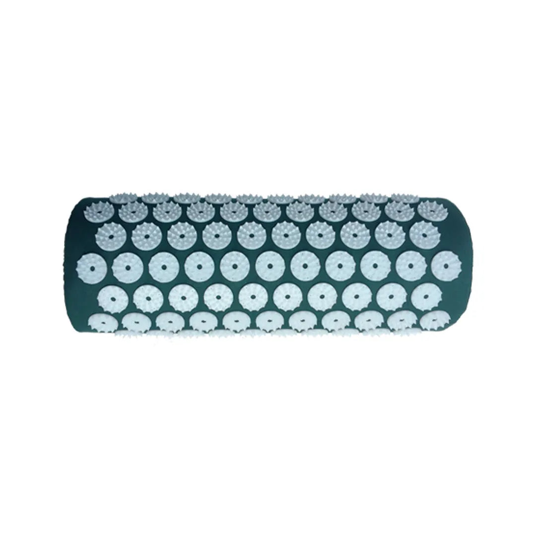 Black and blue acupuncture massage mat with cushion and headrest on floor