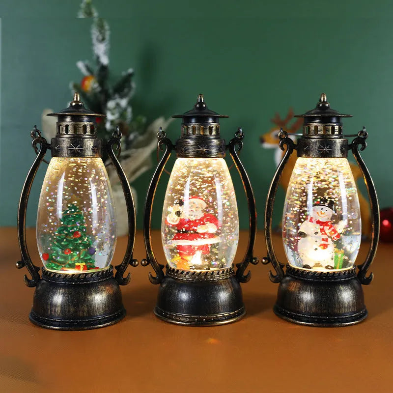Plastic oil lamp snow globe ornament lit up with snowman figurine on a desktop.