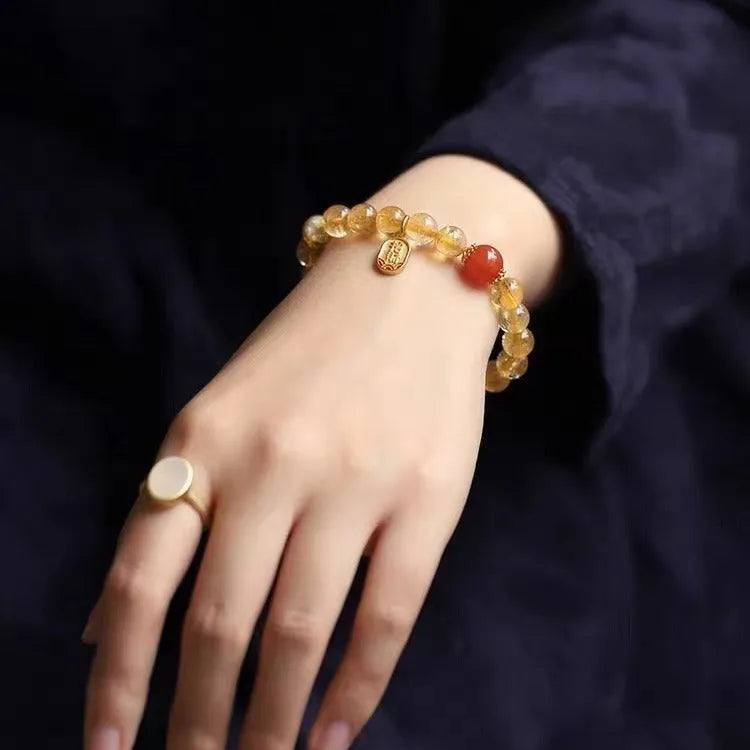 Natural red agate beaded bracelet with polished gold ruby spacers, shown in 6mm, 8mm, and 10mm bead size options.