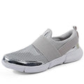 Women's breathable sneakers in black, blue, and grey with mesh lining and low tube design