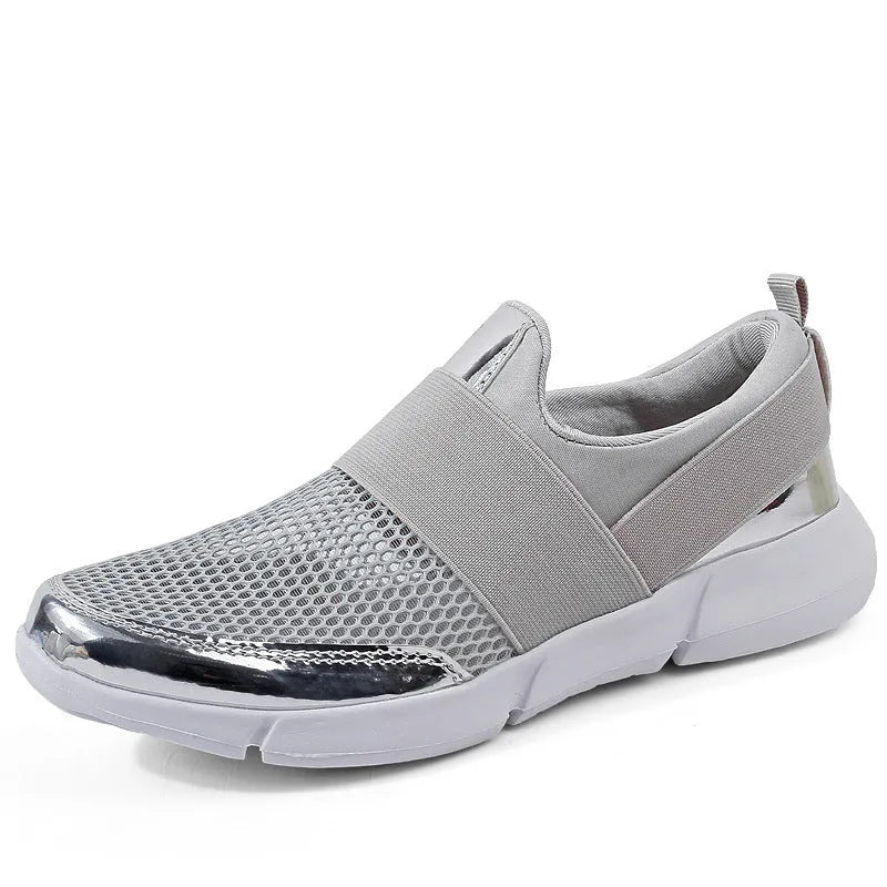 Women's breathable sneakers in black, blue, and grey with mesh lining and low tube design