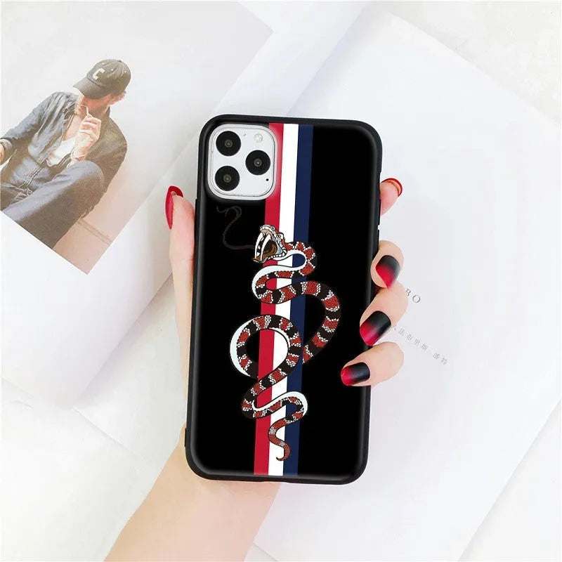 Black frosted soft silicone iPhone case with a cartoon snake UV painting design on the back.