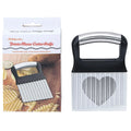 Stainless steel potato wave knife with a 14cm wavy blade on a kitchen worktop