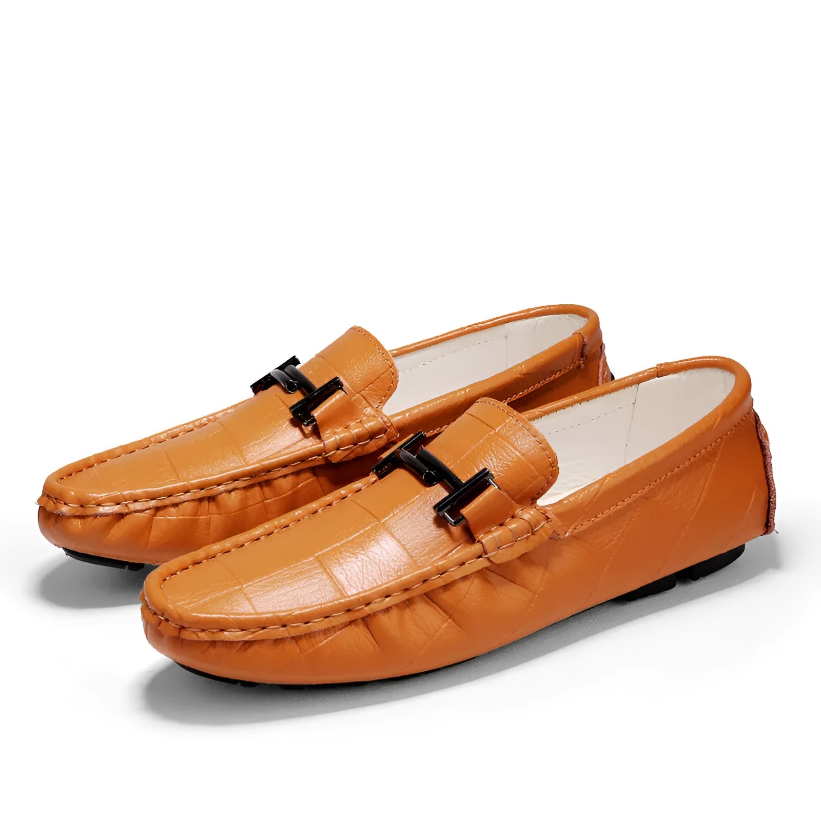Men's low-cut casual leather shoes with a belt buckle on the upper, shown in available colours.