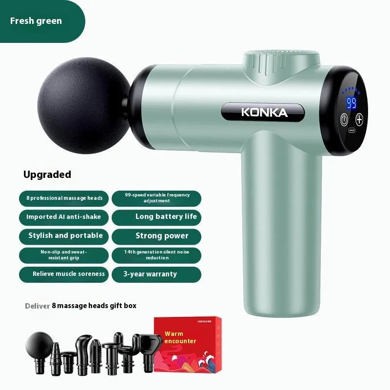 Konka V19 grey professional electric massage gun with set of eight different silicone massage heads on a table.