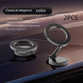 All-metal foldable magnetic car phone mount in Qian colour, shown on a dashboard.