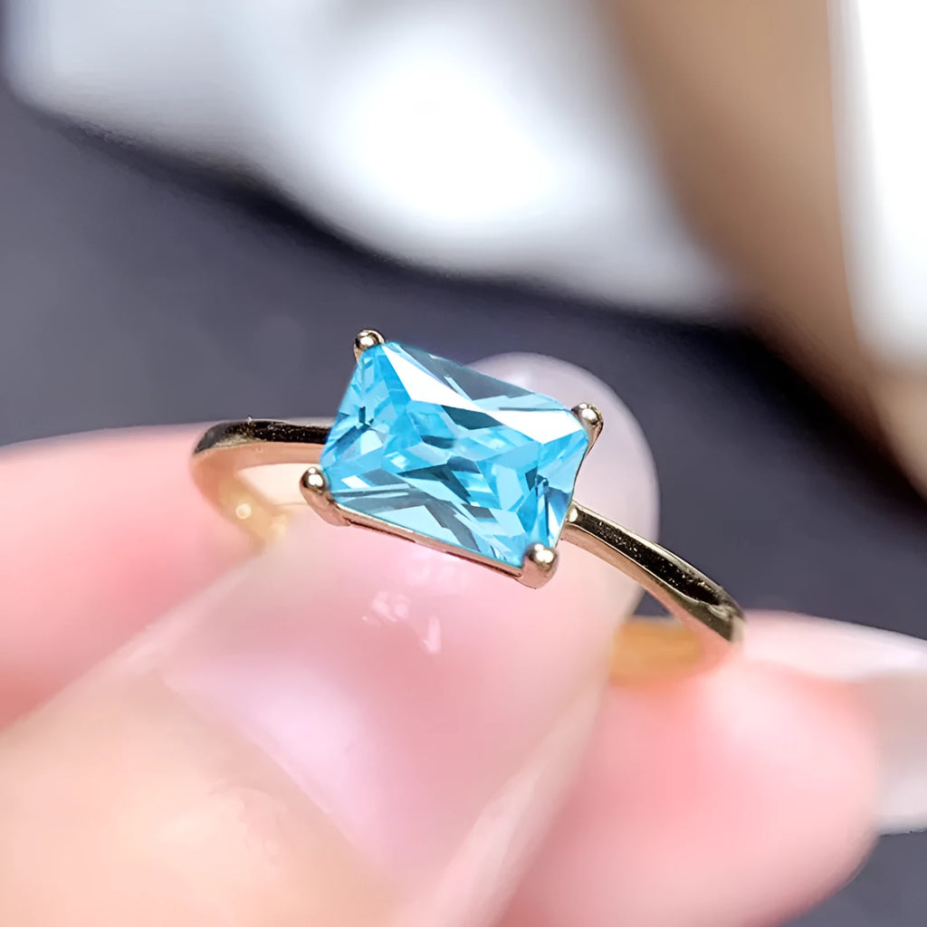 Sapphire blue zircon geometric bracelet ring for women on copper, showing oval and love shapes.