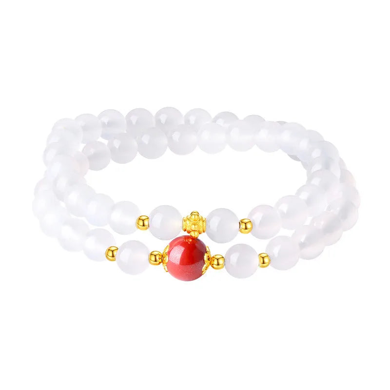 Women's double layer bracelet with white agate geometric beads and Jequirity bean cinnabar accents