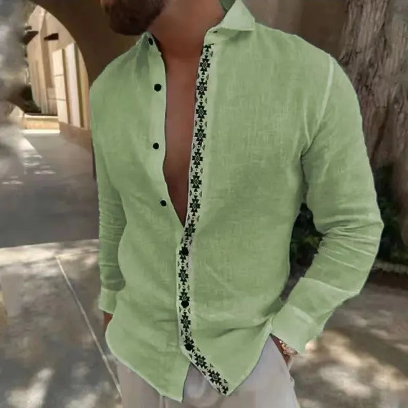 Cotton and linen printed men's shirt with lapel button, long sleeves, and collage stitching in emerald green