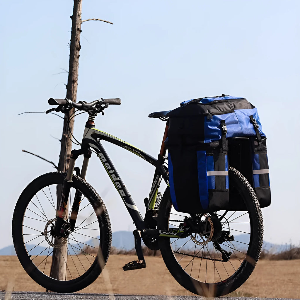 Rhinoceros brand 70-litre capacity bicycle rear frame storage bag in blue colour.