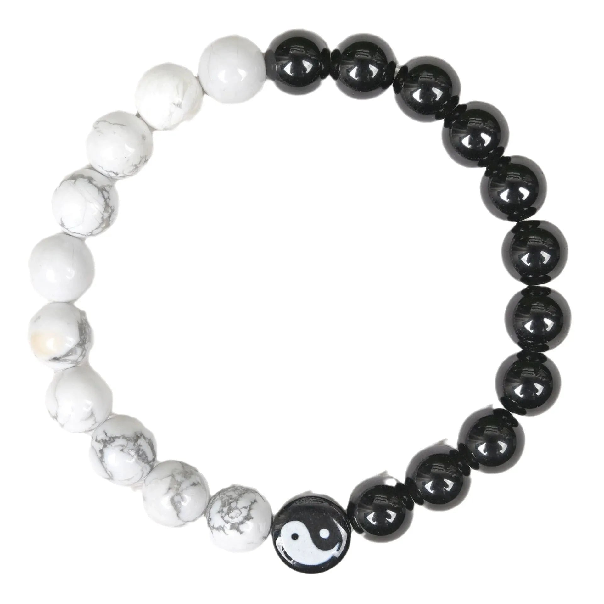 Natural obsidian and white turquoise 8mm bead bracelet on a neutral background