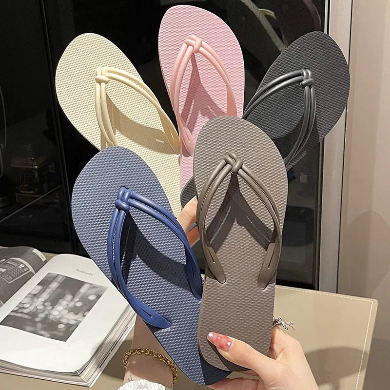 Men's PVC flip flops with toe covering in five colour options showing injection moulded sole detail