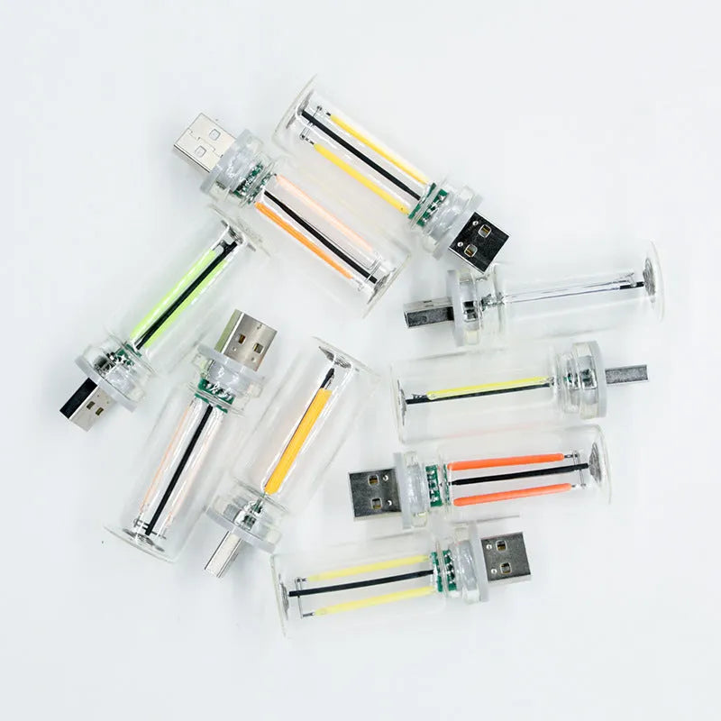RX9001 transparent glass USB touch night lamp showing compact 22x64mm dimensions