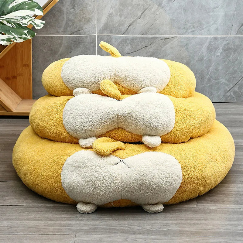 Corgi shaped plush pet bed for dogs and cats with raised edges.