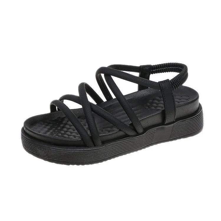 Women's black Roman style platform sandals with a round toe and sleeve design on a white background.