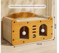 Brown corrugated cardboard cat house with double layer construction and two ball-shaped entrance doors