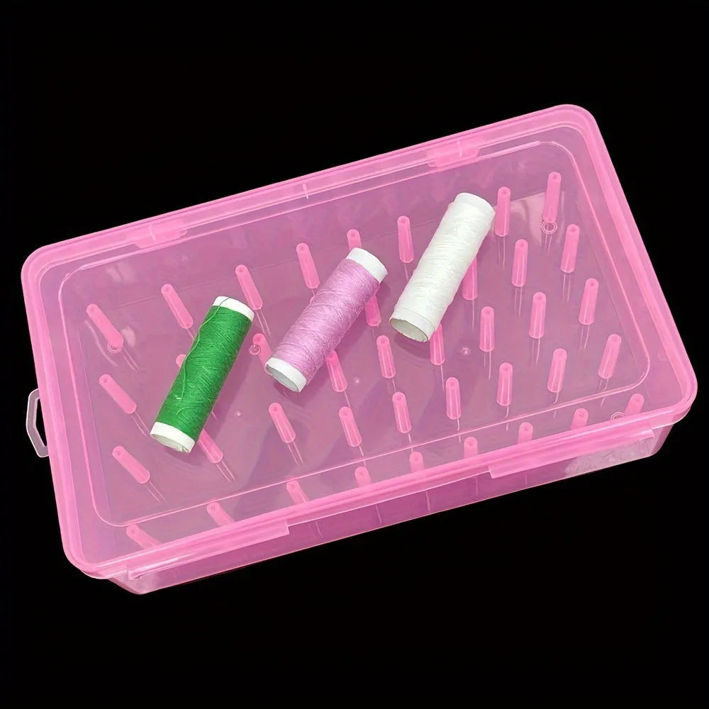 Plastic storage box with 42 compartments for organising embroidery threads and sewing kit accessories.