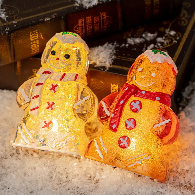 Glowing LED Christmas gingerbread man and snowman ornaments with removable scarves in different colours.