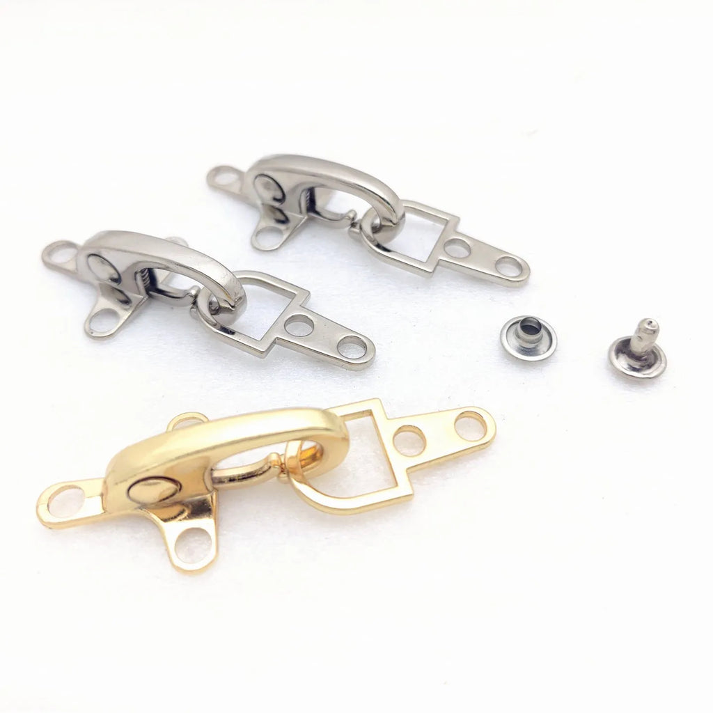 Zinc alloy aircraft buckle in bronze, gold, gun metal and silver, size 5.85 cm.