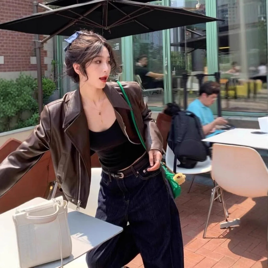 Women's brown retro leather coat jacket with slim fit, regular sleeves, and practical pockets