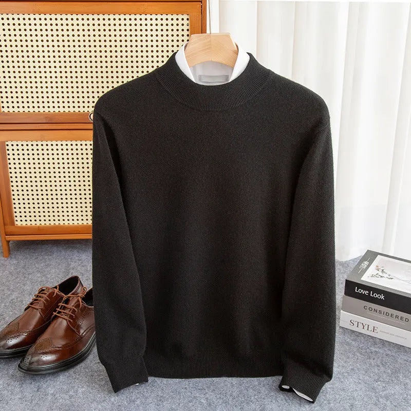 Man wearing a loose-fit half-collar wool sweater in a neutral colour, showing the knitted texture and relaxed fit.